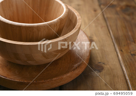 Bamboo dishes, wooden dishes. Eco-friendly choice and nature friendly. The concept of a world Bamboo dishes, wooden dishes. Eco-friendly choice and nature friendly. The concept of a world 69495059