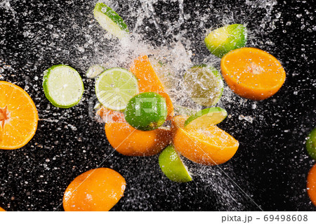 Freeze Motion Shot of Fresh Fruits Collision Freeze Motion Shot of Fresh Fruits Collision 69498608