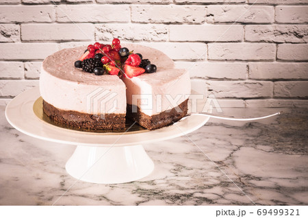 Mousse cake on cake plate 69499321