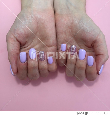 Manicure of different colors on nails. Female 69500046