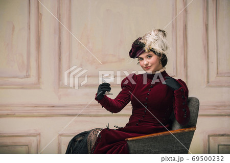 Modern trendy look of Portrait of an Unknown Woman. Retro style, comparison of eras concept. 69500232
