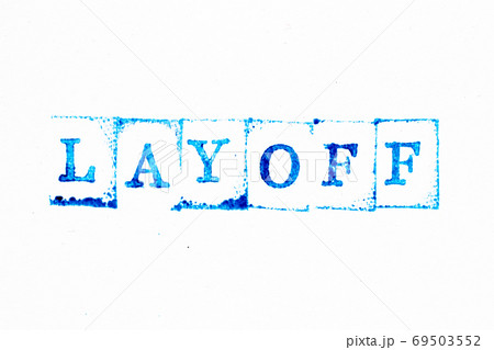 Blue color ink of rubber stamp in word layoff on white paper background 69503552