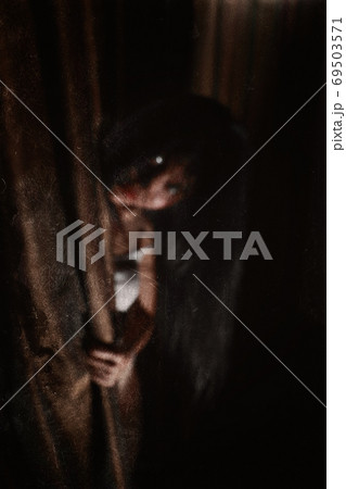 blurry image of ghost women in haunted hotel with old filter photo, halloween concept 69503571