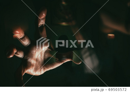 blurry image double exposure ghost woman hand in haunted hotel with dark filter, halloween concept 69503572