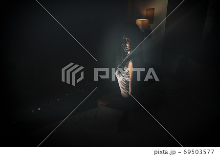 double exposure of ghost woman in haunted hotel with dark filter, halloween concept 69503577