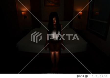 ghost woman in haunted hotel with dark filter, halloween concept ghost woman in haunted hotel with dark filter, halloween concept 69503588