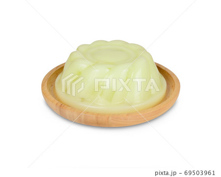 pudding melon in wooden round plate on white background pudding melon in wooden round plate on white background 69503961