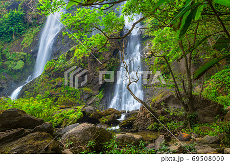Khlong Lan Waterfall, the beautiful waterfall in deep forest at Khlong Lan National Park ,Kamphaeng Phet, Thailand 69508009