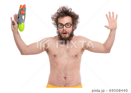 Crazy bearded man - beach concept Crazy bearded man - beach concept 69508440