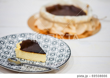basque burnt cheesecake in dish, spanish dessert 69508666