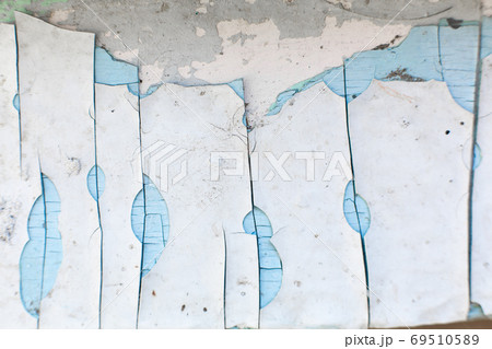 paint peels off the wall. Mill painting with a large number of layers of old paint paint peels off the wall. Mill painting with a large number of layers of old paint 69510589