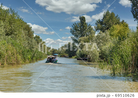 Danube biosphere reserve Ankudinovo river summer landscape. Vilkove, Ukraine. Danube biosphere reserve Ankudinovo river summer landscape. Vilkove, Ukraine. 69510626