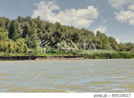 Danube riverbank summer landscape close to Biosphere Reserve. Vilkove, Ukraine. Danube riverbank summer landscape close to Biosphere Reserve. Vilkove, Ukraine. 69510627