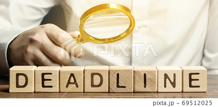 Wooden blocks with the word Deadline and freelancer. A narrow field of time by which an objective must be accomplished. Time limit. Implementation of tasks and stages of the project. Business concept Wooden blocks with the word Deadline and freelancer. A narrow field of time by which an objective must be accomplished. Time limit. Implementation of tasks and stages of the project. Business concept 69512025
