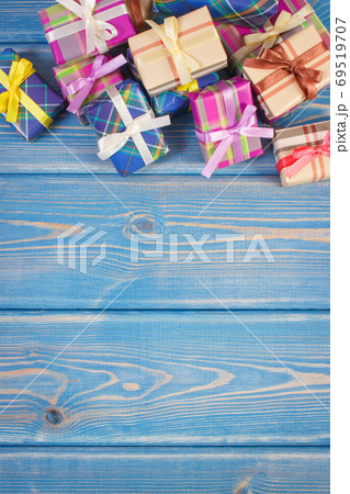 Wrapped colorful gifts with ribbons for Christmas or other celebration. Copy space for text 69519707