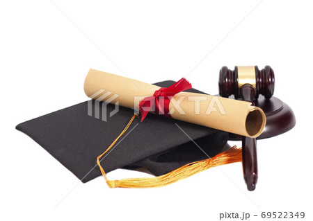 Black Graduation Hat with Diploma and Gavel 69522349