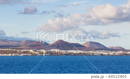The view towards the resort of Costa Teguise on the Spanish Canary Island of Lanzarote. The view towards the resort of Costa Teguise on the Spanish Canary Island of Lanzarote. 69522905