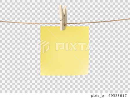 Yellow paper sticky note hanging on a rope Yellow paper sticky note hanging on a rope 69523617