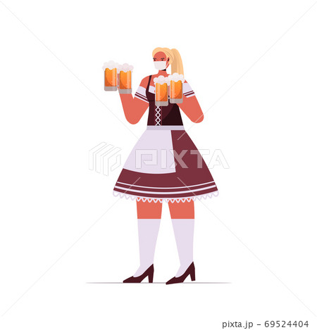 woman in medical mask holding beer mugs Oktoberfest party celebration coronavirus quarantine concept woman in medical mask holding beer mugs Oktoberfest party celebration coronavirus quarantine concept 69524404