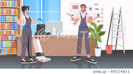 professional cleaners janitors couple cleaning and disinfecting floor to prevent coronavirus pandemic 69524631