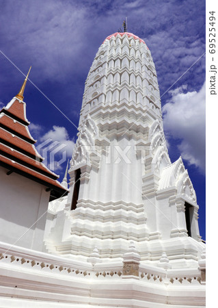 The main monument is white Prang shaped Stupa at Phutthaisawan temple in Thailand. The main monument is white Prang shaped Stupa at Phutthaisawan temple in Thailand. 69525494