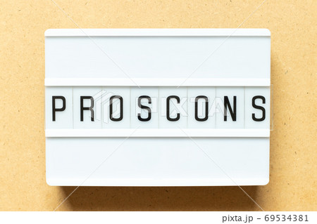 Lightbox with word pros cons on wood background Lightbox with word pros cons on wood background 69534381