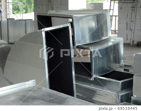 KUALA LUMPUR, MALAYSIA - AUGUST 31, 2019: Air-condition and ventilation duct under construction at the construction site. Distributing cool air and control the room's temperature. KUALA LUMPUR, MALAYSIA - AUGUST 31, 2019: Air-condition and ventilation duct under construction at the construction site. Distributing cool air and control the room's temperature. 69538445