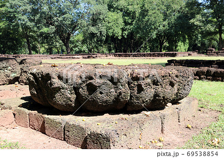 Laterite stone lotus blossom carved in archaeological site of Srithep ancient town at Petchaboon Laterite stone lotus blossom carved in archaeological site of Srithep ancient town at Petchaboon 69538854
