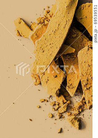 Yellow eye shadow powder as makeup palette closeup, crushed cosmetics and beauty texture 69539551