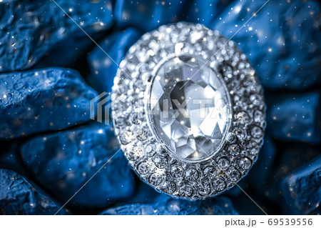 Luxury diamond earrings closeup, jewelry and fashion brand Luxury diamond earrings closeup, jewelry and fashion brand 69539556