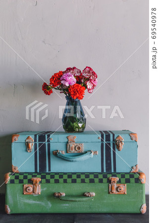 A pair of old vintage colored suitcases, trunks, A pair of old vintage colored suitcases, trunks, 69540978