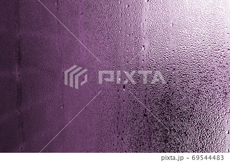 Texture of a drop of rain on a glass wet transparent background. 69544483