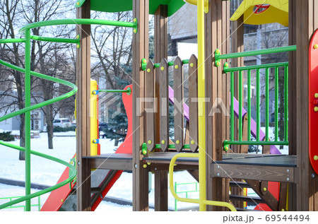 Fragment of a playground made of plastic and wood, painted in di Fragment of a playground made of plastic and wood, painted in di 69544494