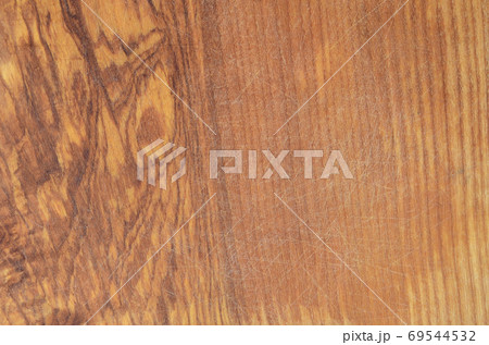 Detailed texture of the wooden cutting board with a lot of scars Detailed texture of the wooden cutting board with a lot of scars 69544532