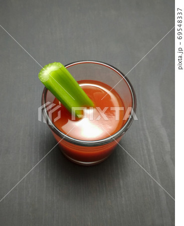 Bloody Mary or The Vampire Cocktail (sangrita cocktail) and celery stick. top view 69548337