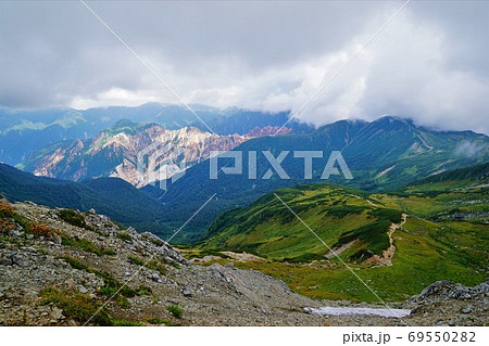 三俣蓮華岳からの硫黄尾根と双六岳の写真素材