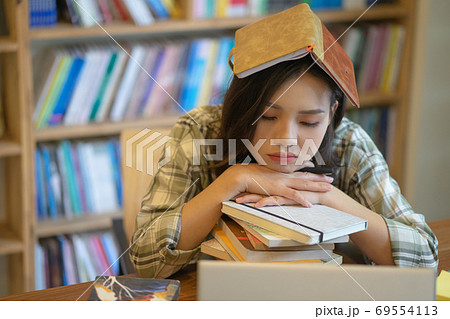 Woman in library Woman in library 69554113