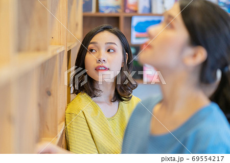 Woman in library 69554217