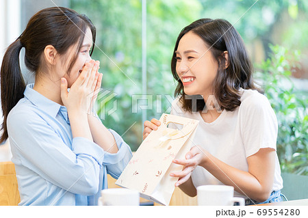 Woman, gift, holiday Woman, gift, holiday 69554280