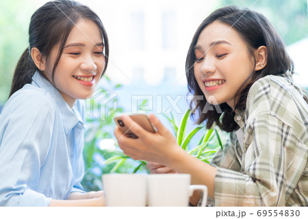 two woman conversation two woman conversation 69554830
