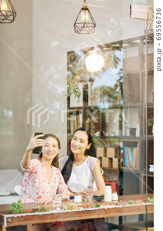 Friends taking selfie 69556736