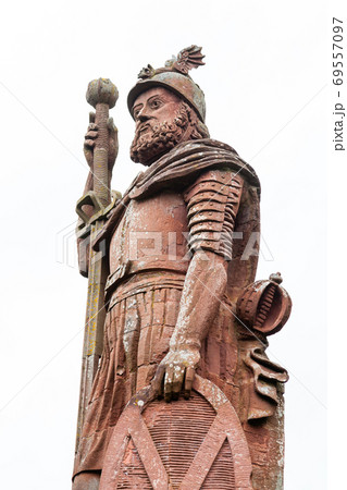 William Wallace Monument. William Wallace was a Scottish knight and the red sandstone monument is located near Melrose in the Scottish Borders. William Wallace Monument. William Wallace was a Scottish knight and the red sandstone monument is located near Melrose in the Scottish Borders. 69557097