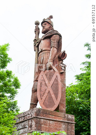William Wallace Monument. William Wallace was a Scottish knight and the red sandstone monument is located near Melrose in the Scottish Borders. 69557112