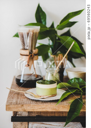 Green matcha cheesecake and brewed pour-over Green matcha cheesecake and brewed pour-over 69560243