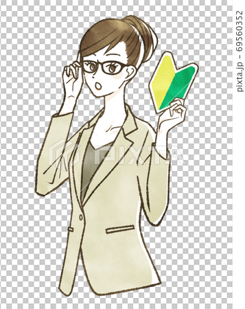 A woman in a suit holding a beginner mark 69560352