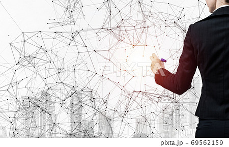 Businesswoman pointing on abstract 3d network Businesswoman pointing on abstract 3d network 69562159