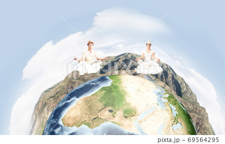 Young couple keeping mind conscious. 69564295