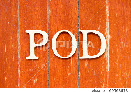 Alphabet letter in word POD (Abbreviation of point of delivery) on old red color wood plate background Alphabet letter in word POD (Abbreviation of point of delivery) on old red color wood plate background 69568658