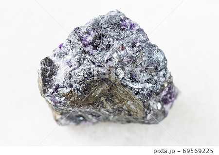 unpolished Stibnite (Antimonite) ore on white unpolished Stibnite (Antimonite) ore on white 69569225