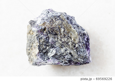 rough Stibnite (Antimonite) ore on white marble rough Stibnite (Antimonite) ore on white marble 69569226